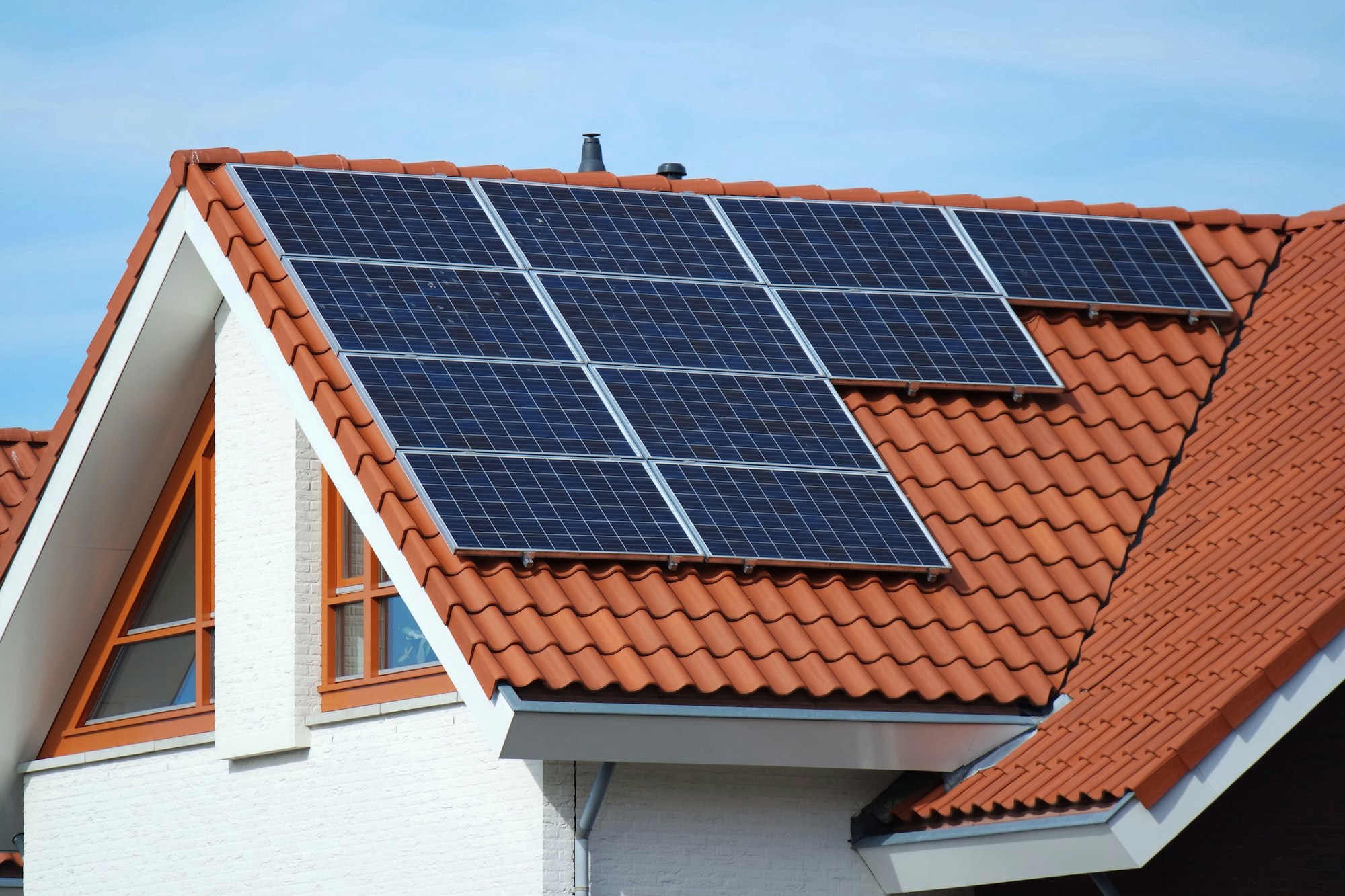 Roof top with solar panels for green energy.